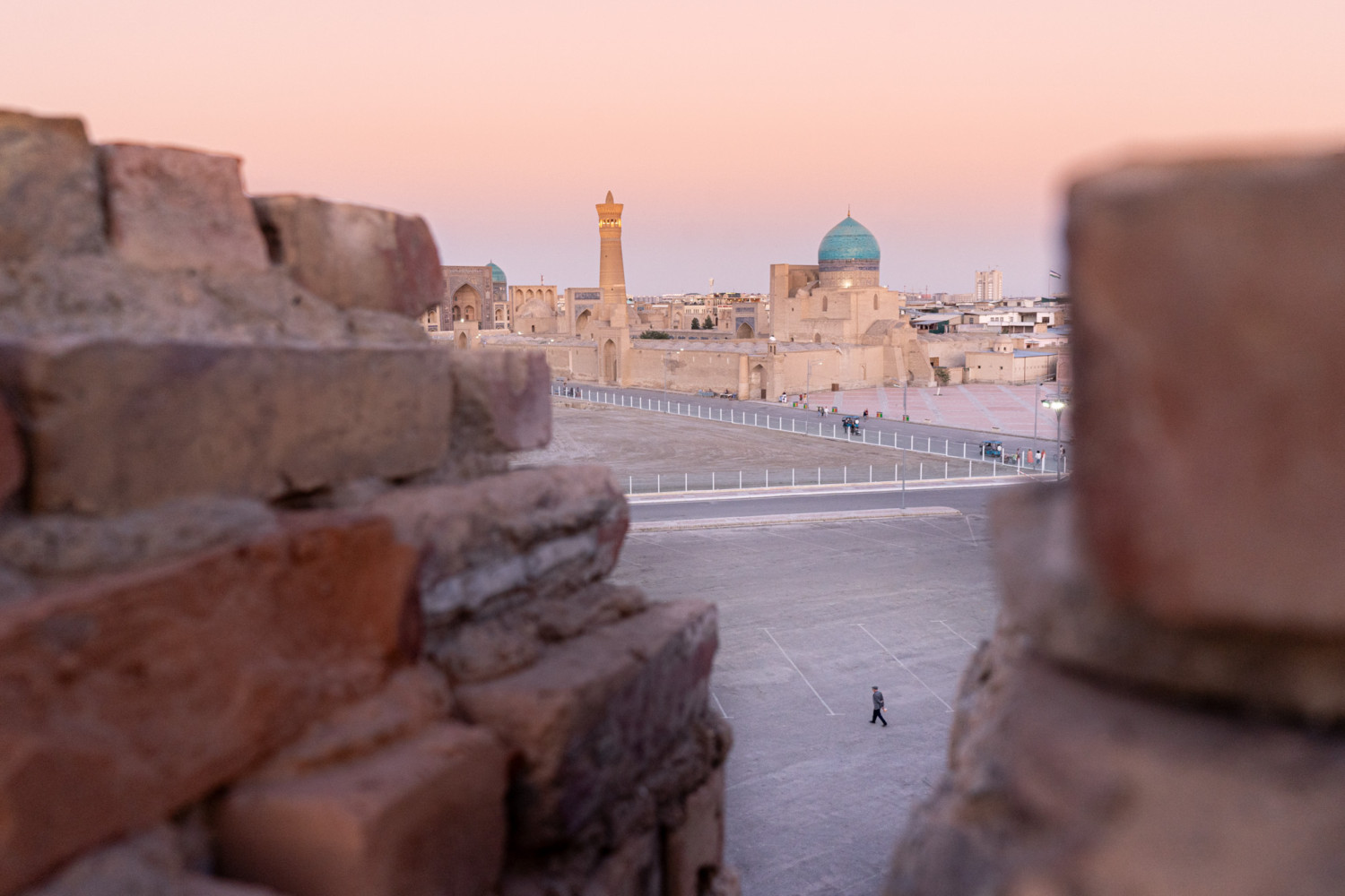 A man walks through the outskirts of Bukhara, Uzbekistan. A Fresh Perspectives in Travel Photography