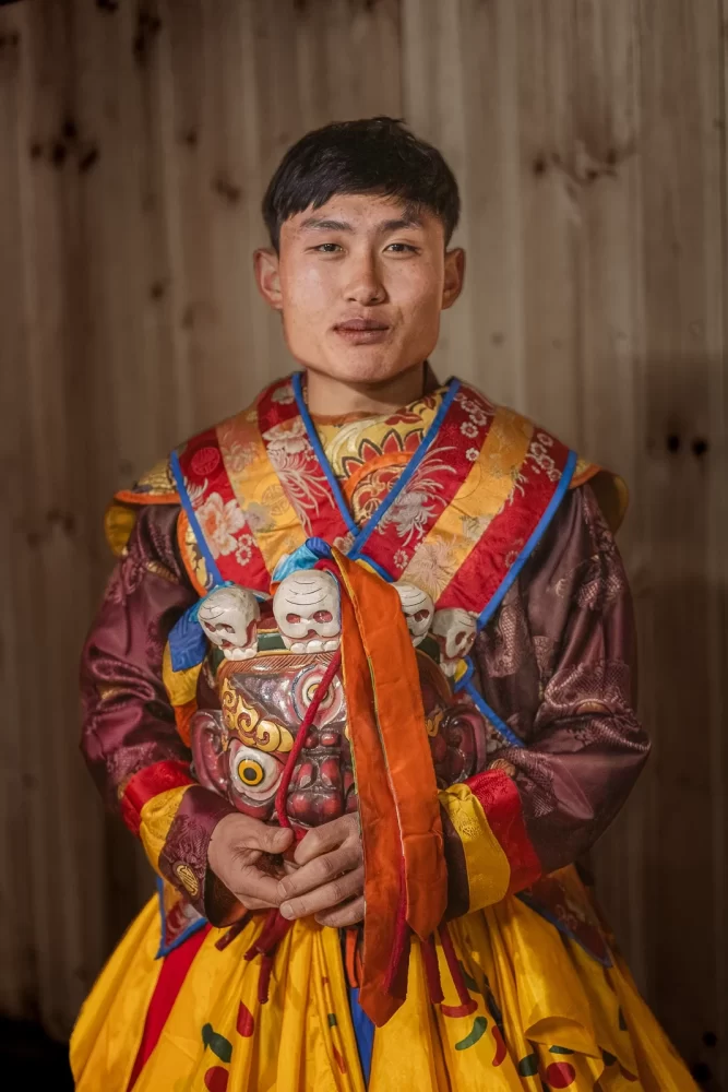 Masked Dancer in Bhutan - Tom Bourdon Travel Photography